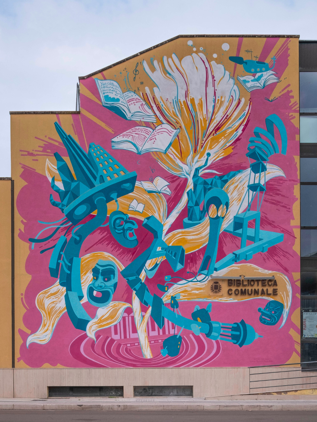 Murale su facciata biblioteca